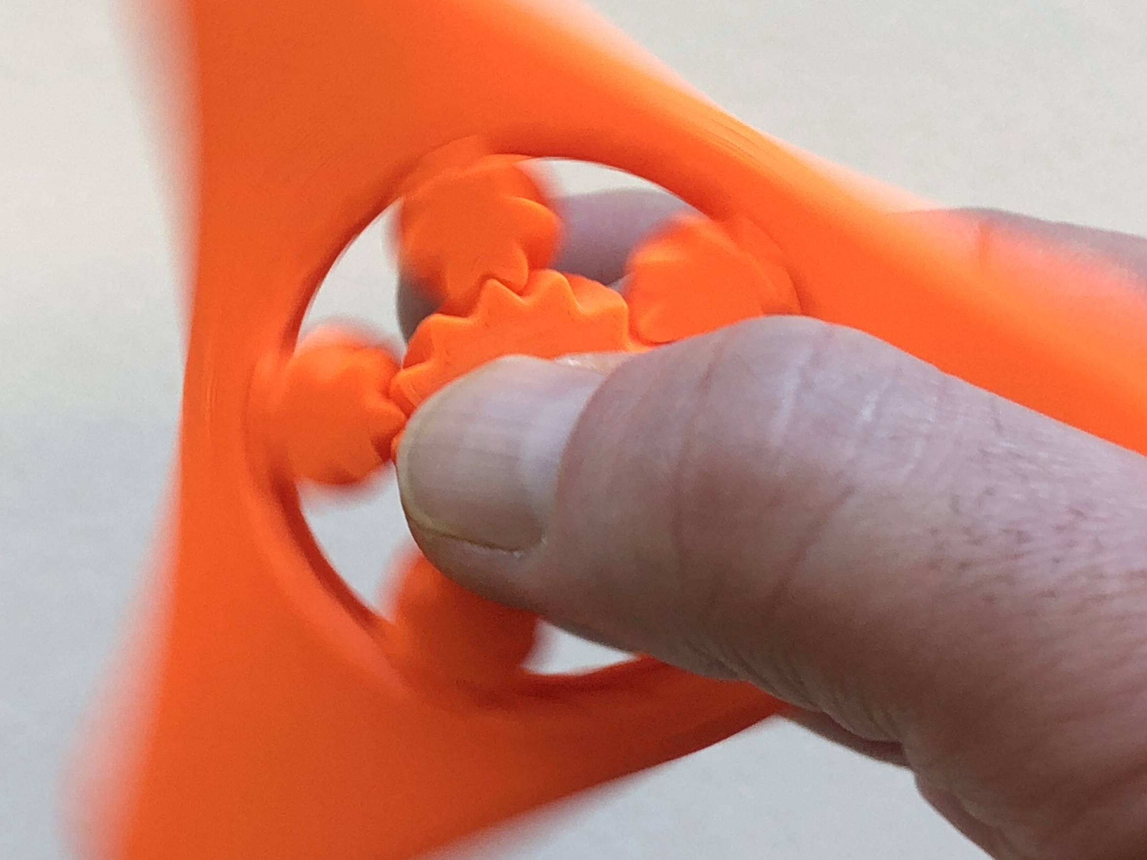 Gear bearing spinner