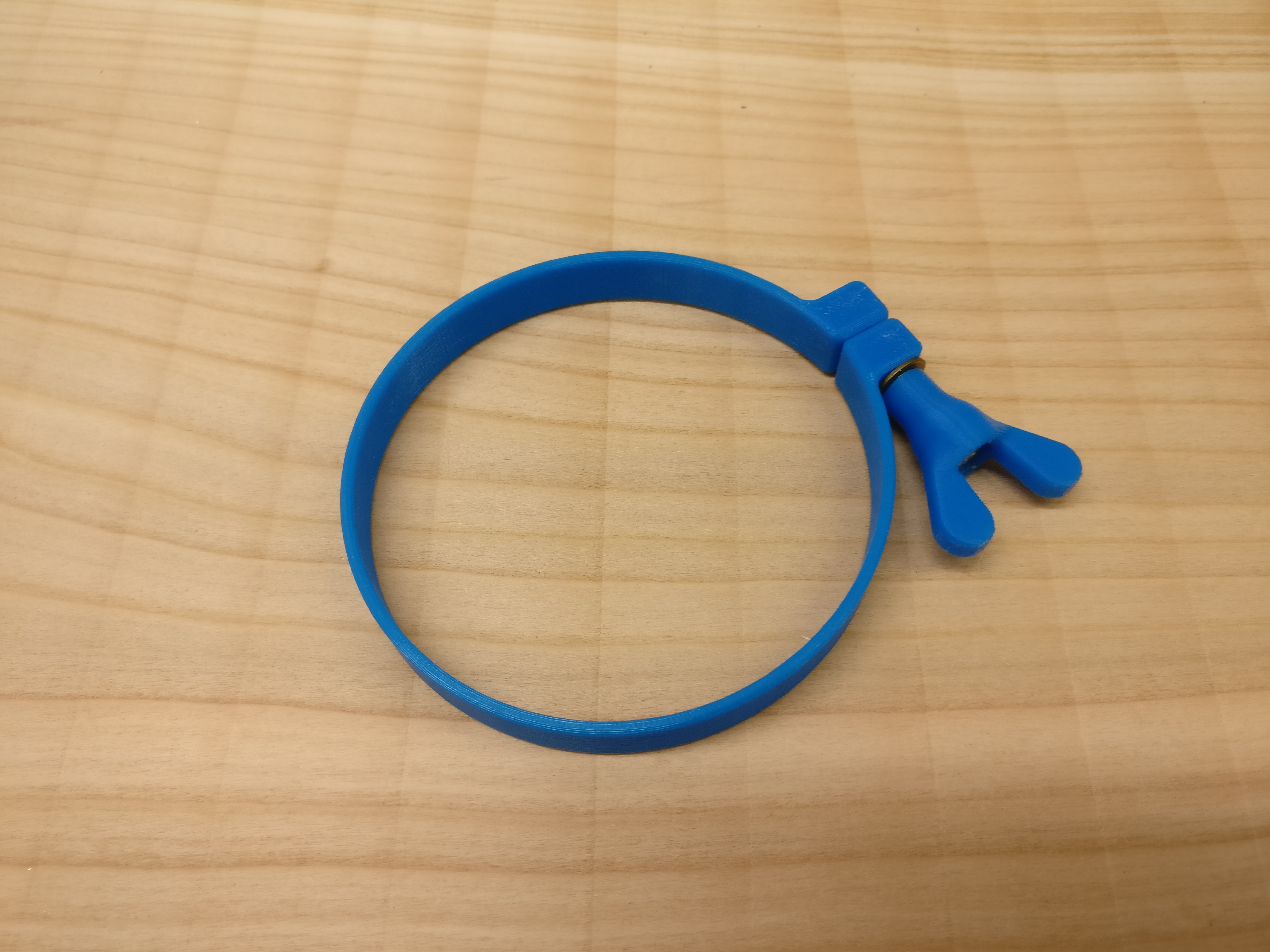 Hose clamp with knob