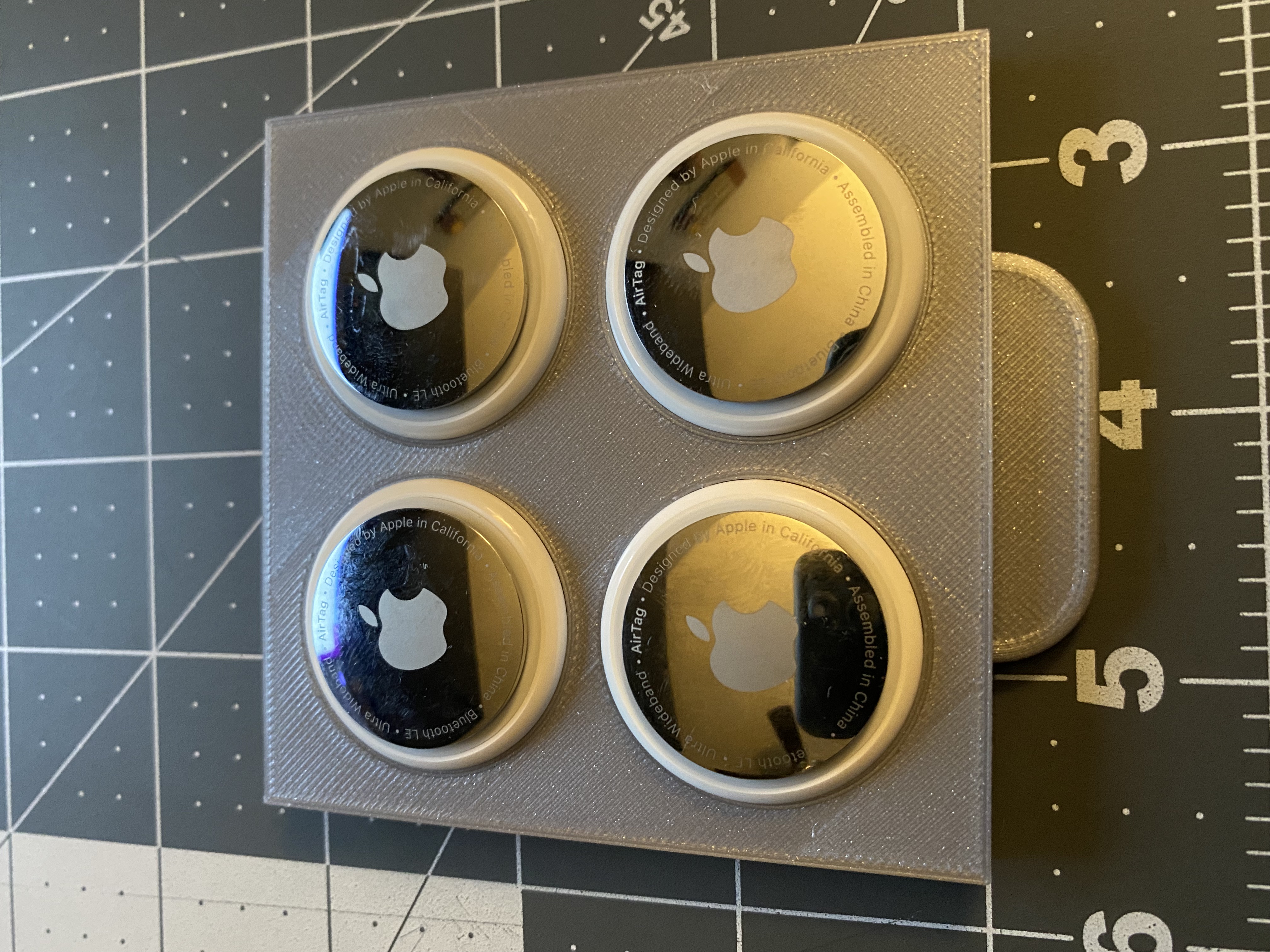 Apple AirTag under shelf/desk storage drawer