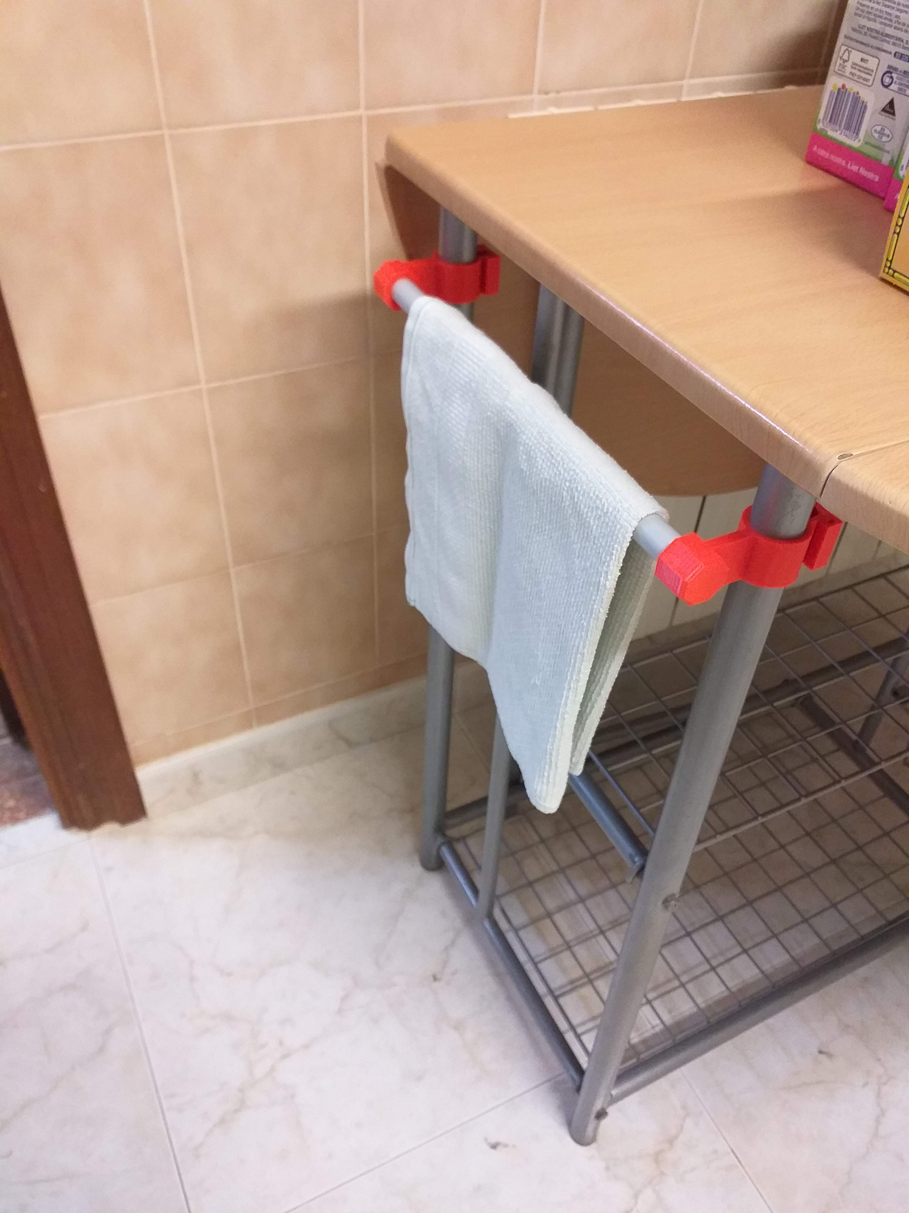 Clothes hanger for kitchen table