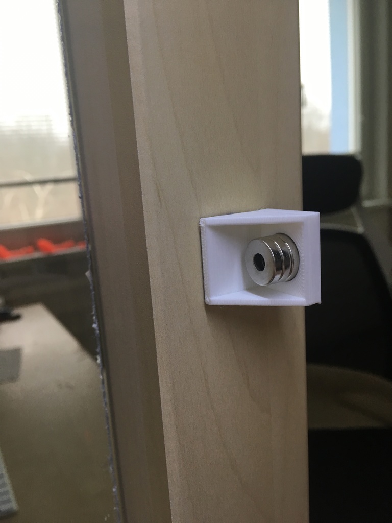 Magnetic door holder - photo 2