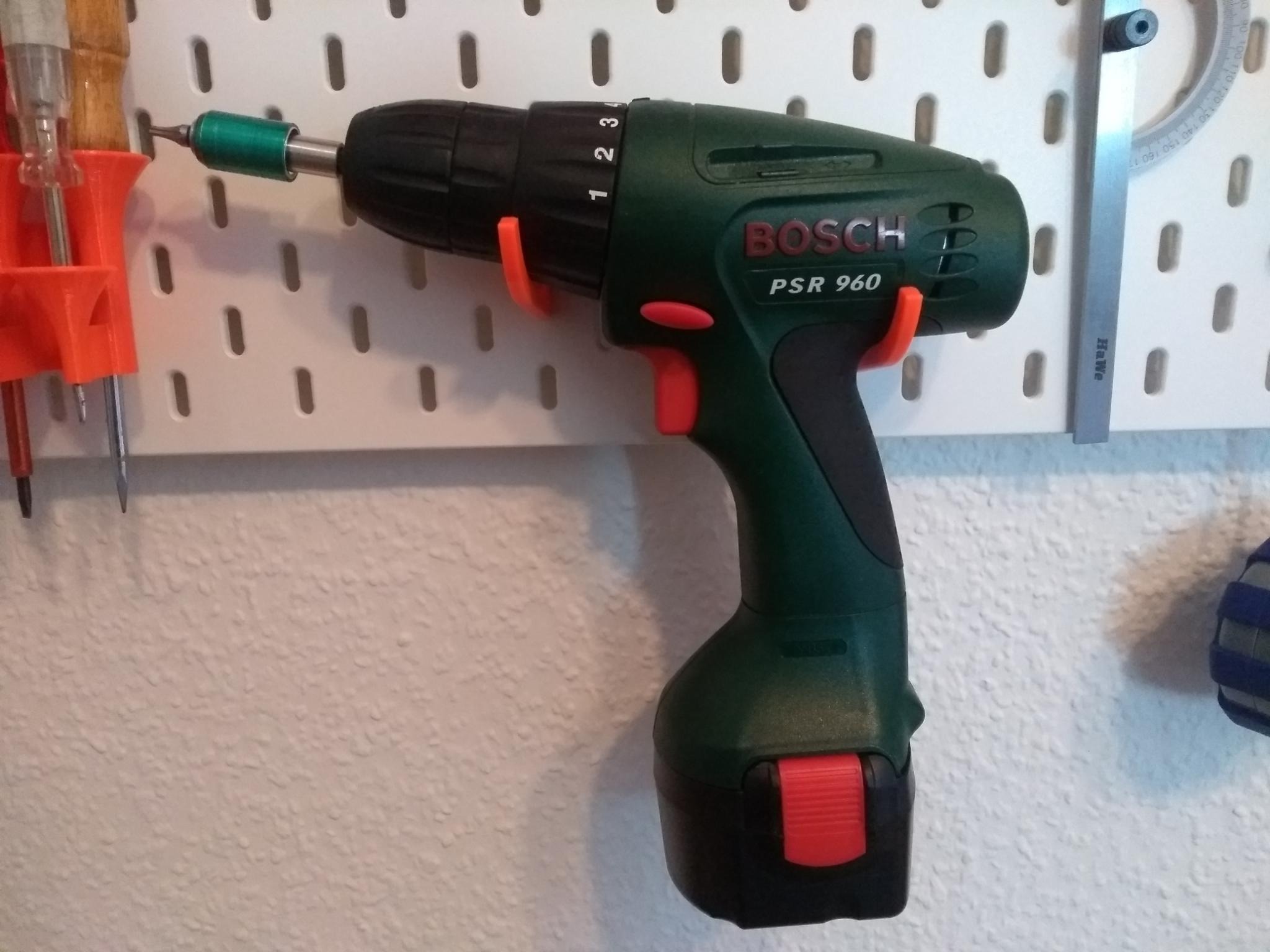 Ikea Skadis pegboard hook for cordless drill/gamepad/handheld vacuum cleaner and others