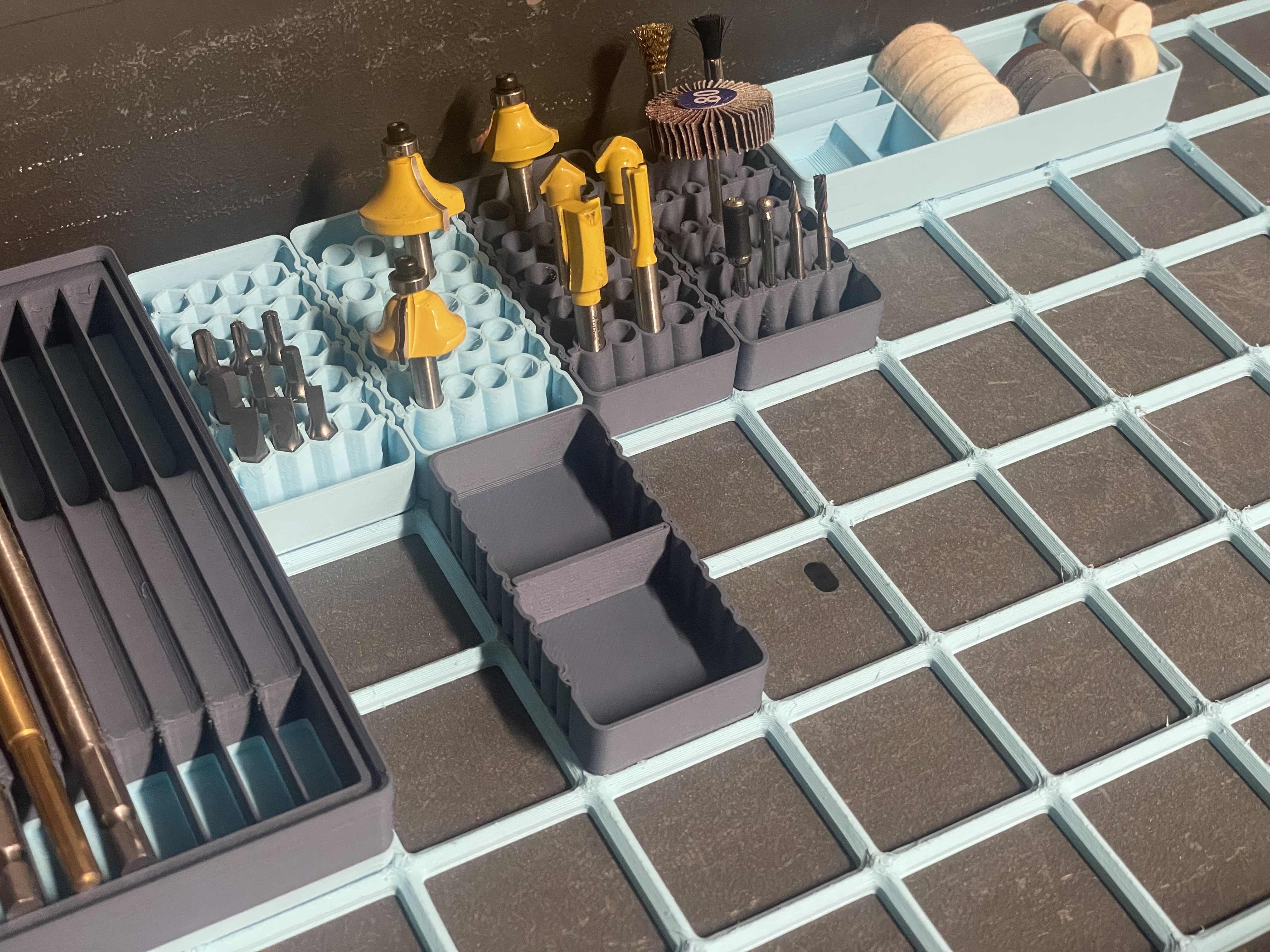 Modular Gridfinity storage for hex bits, 1/8, 1/4, 8mm bits, or small parts.
