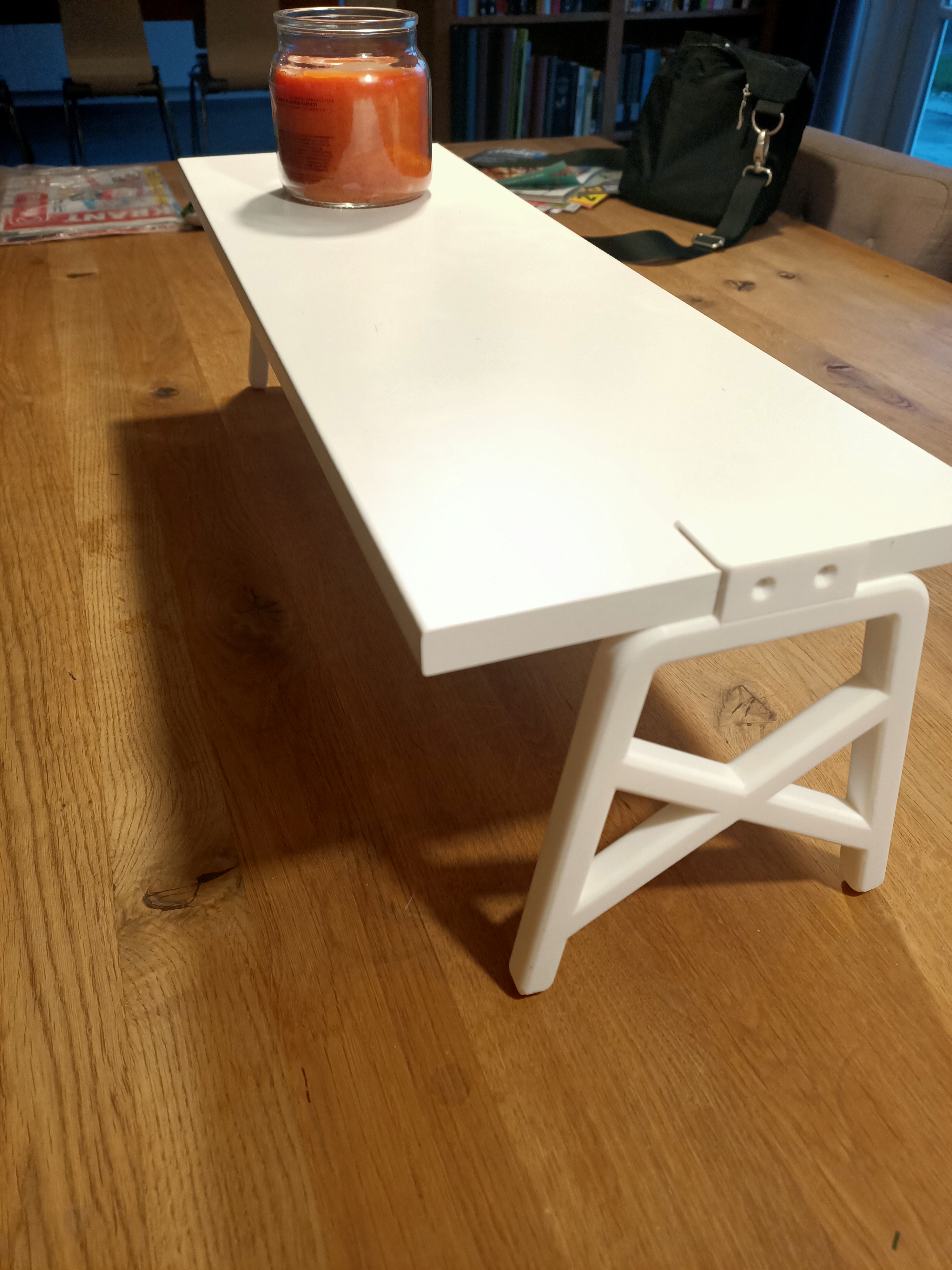 Shelf raiser
