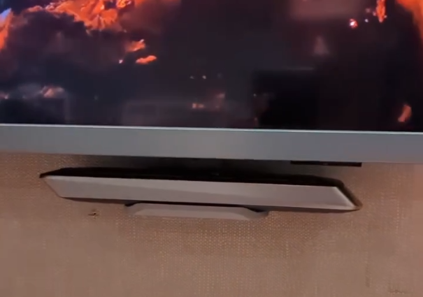 A TV remote shelf for wall mounted Philips TV