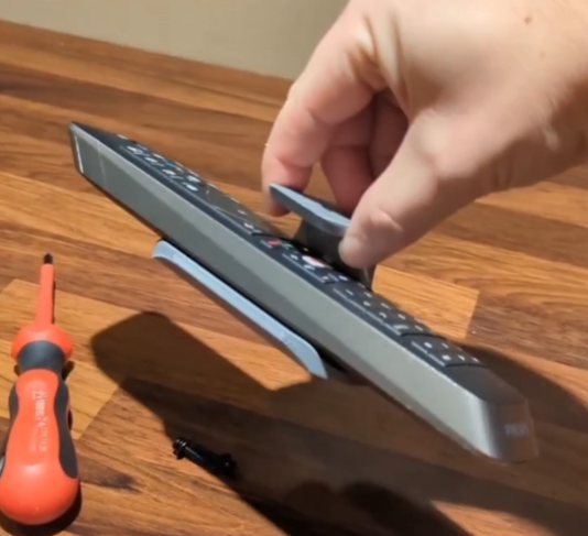 A TV remote shelf for wall mounted Philips TV - photo 2
