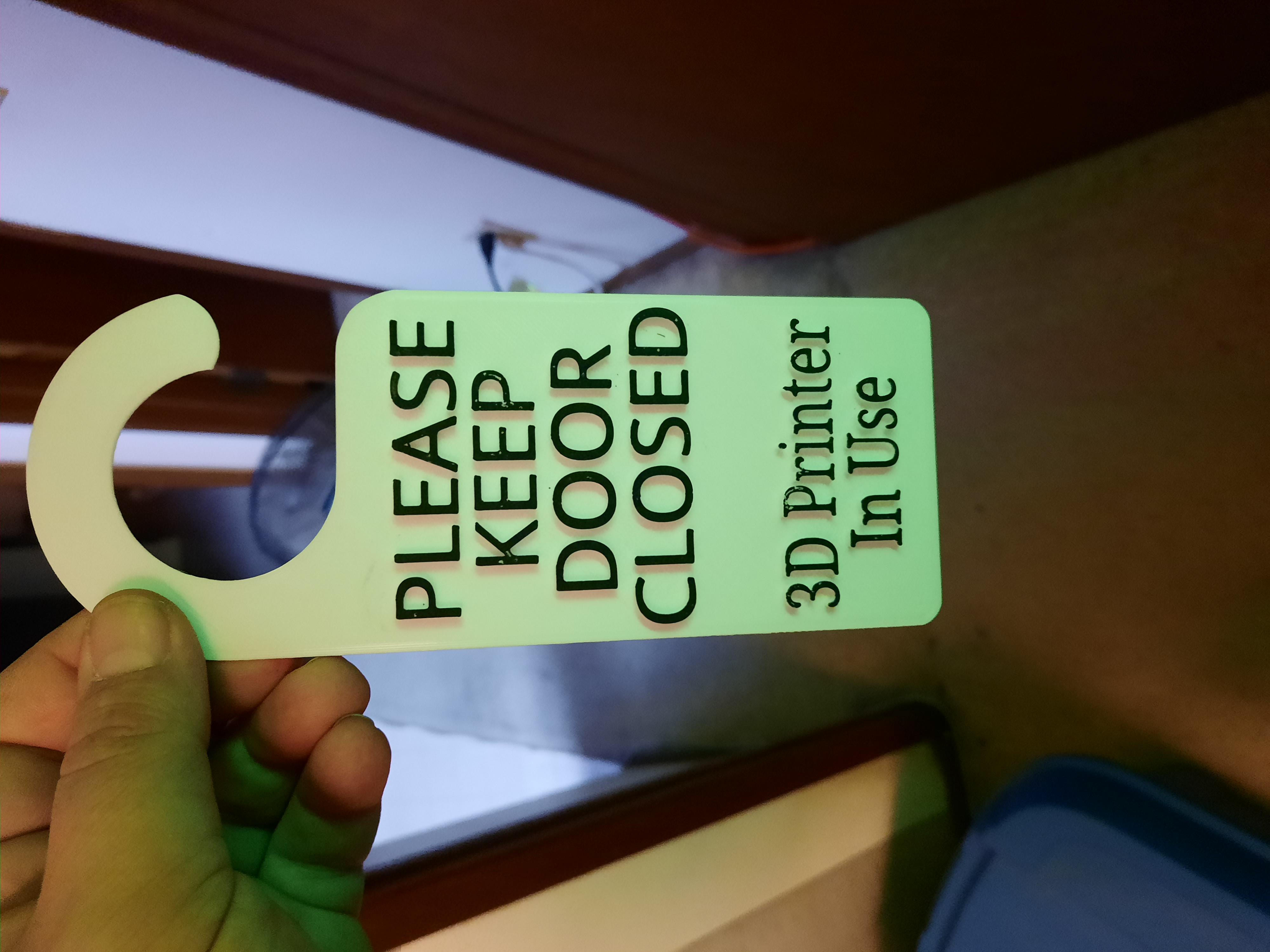 Printing in progress door hanger
