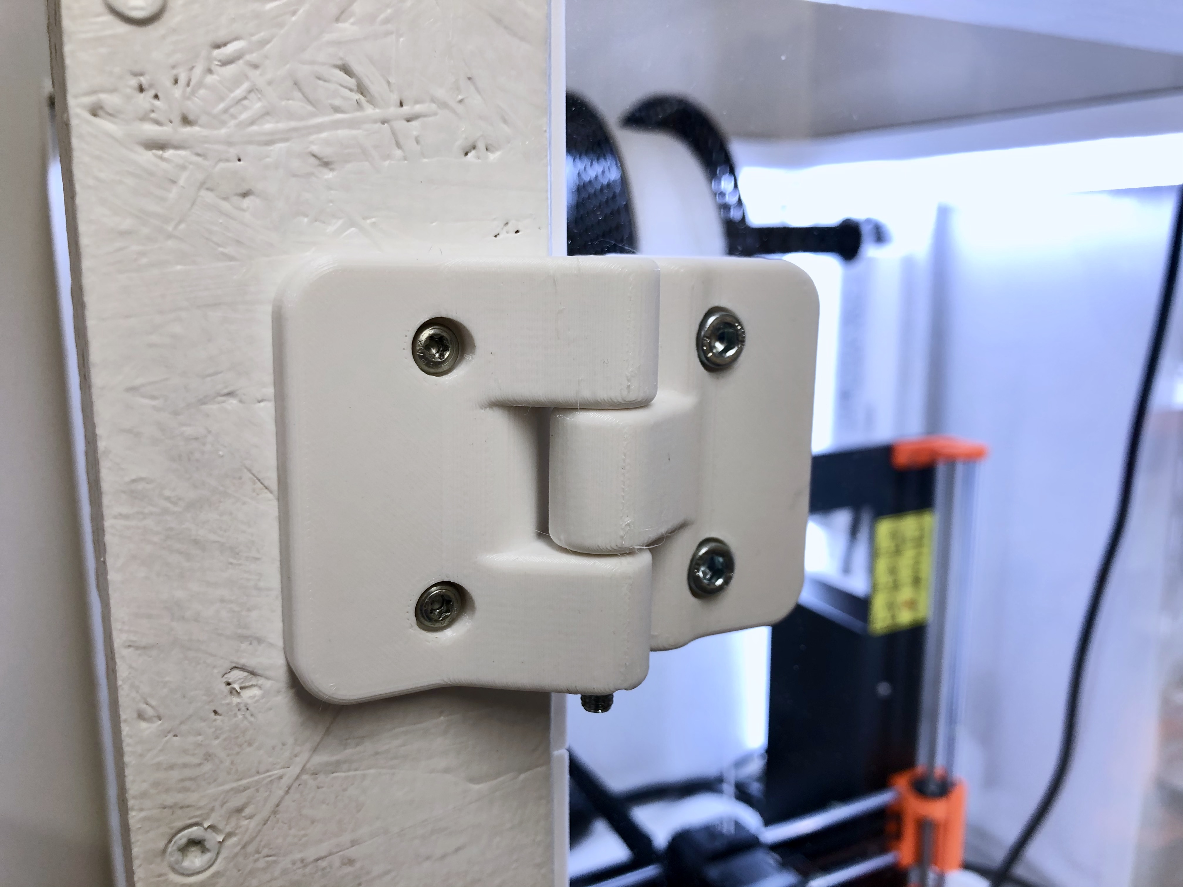 Two hinges to attach an acrylic glass door to a wooden frame