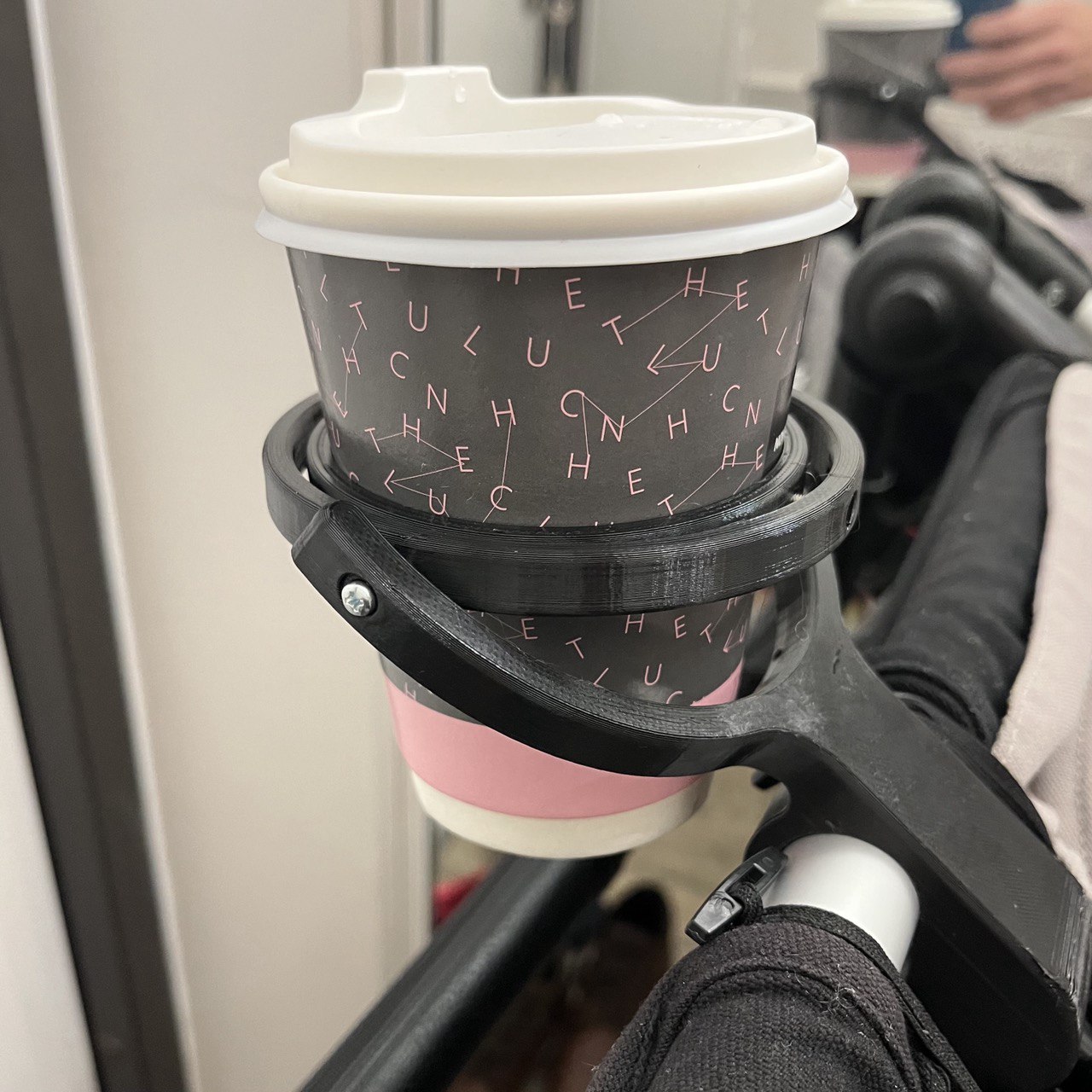 Stroller hook with gyroscopic cupholder