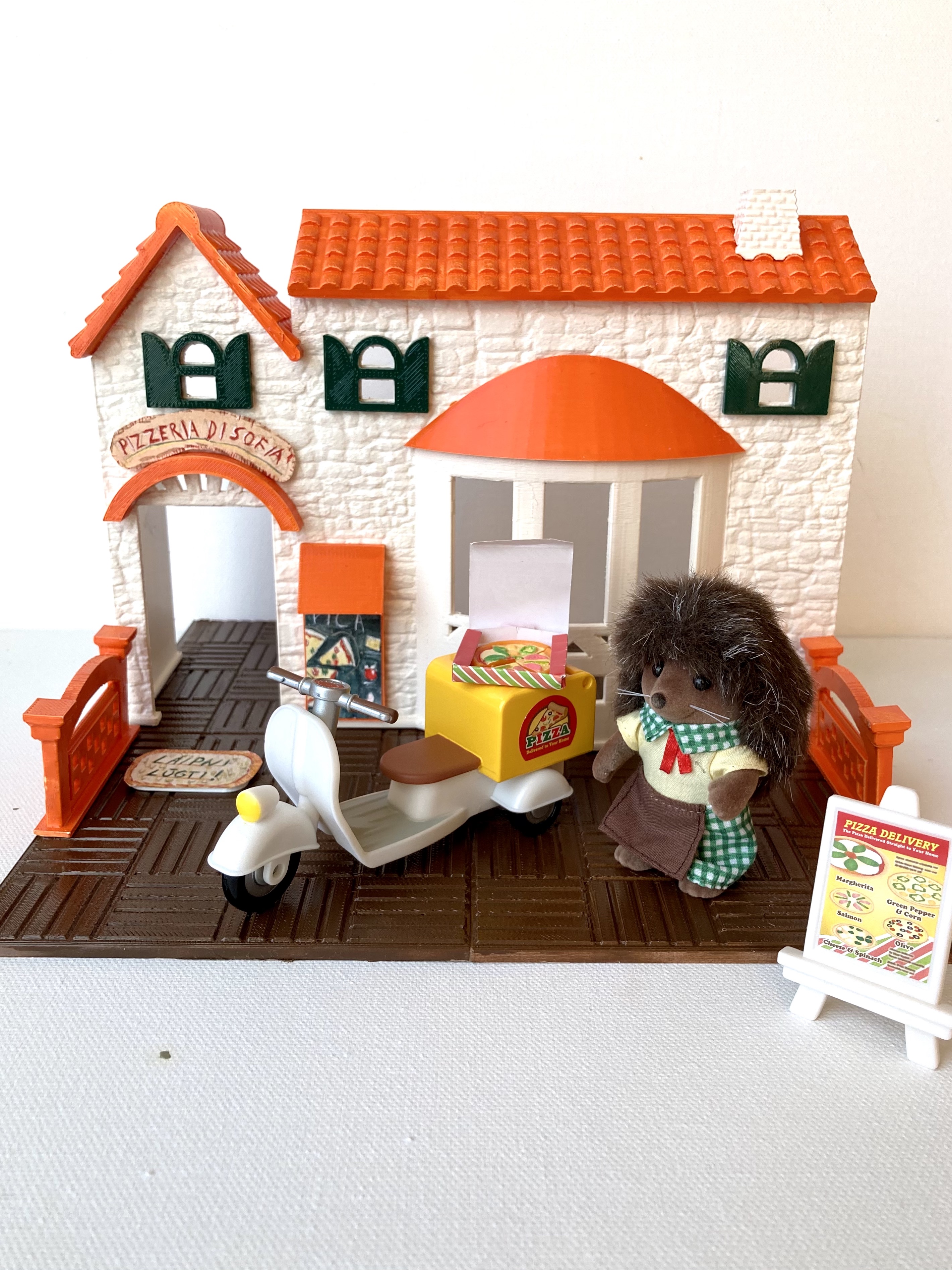 Textured pizzeria toy house with oven