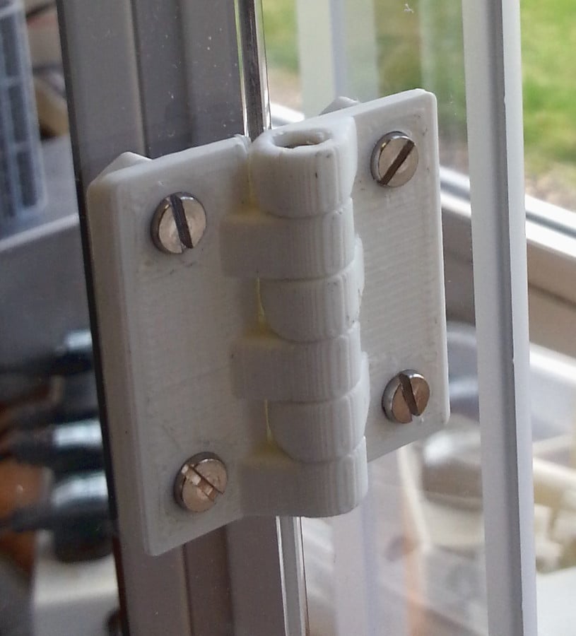 Door with hinges and snapper