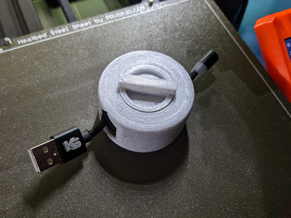 Print-in-place cable winder "puck", no supports necessary (uses slicer trick)
