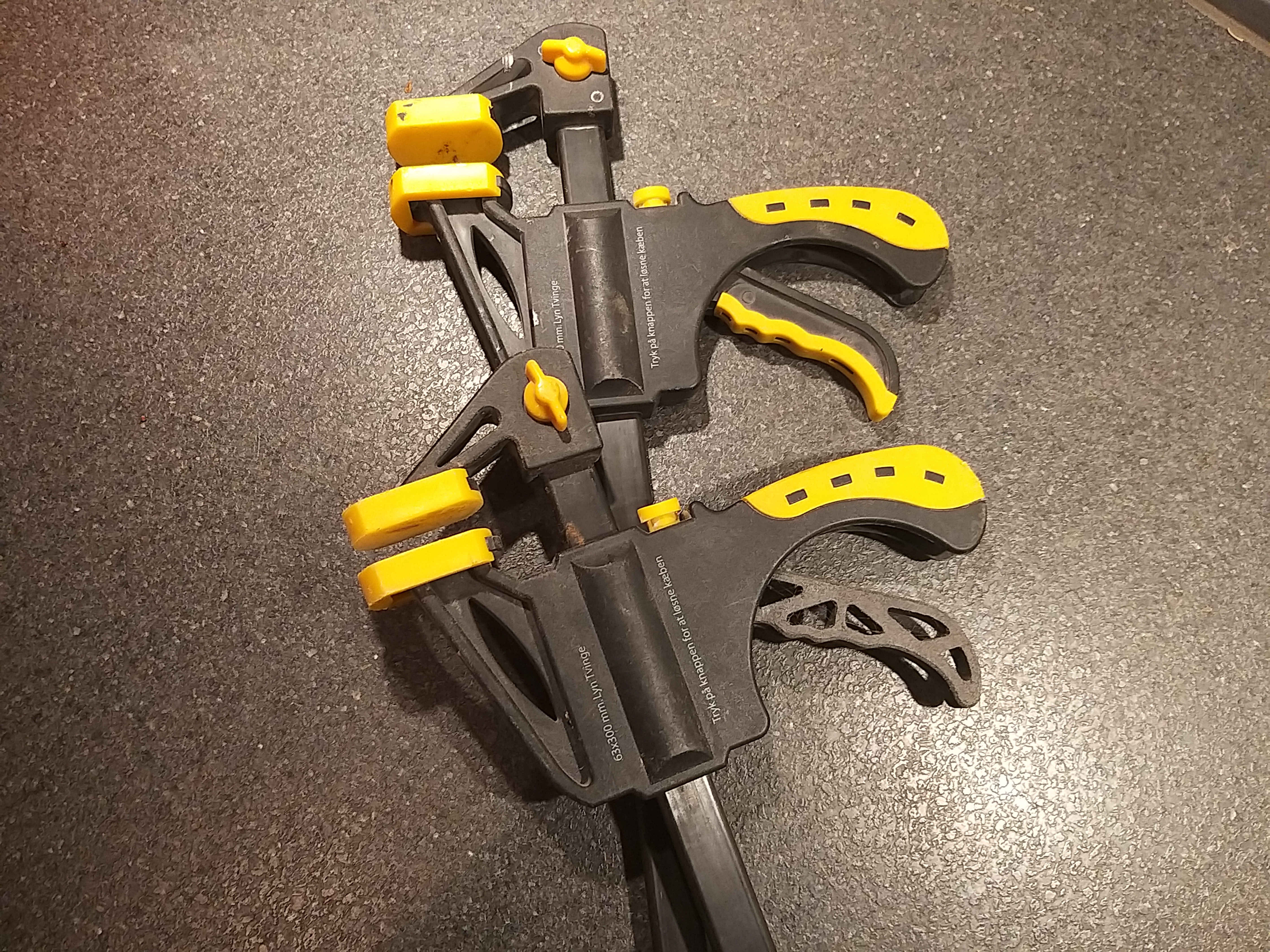 Handle for ratchet bar clamp