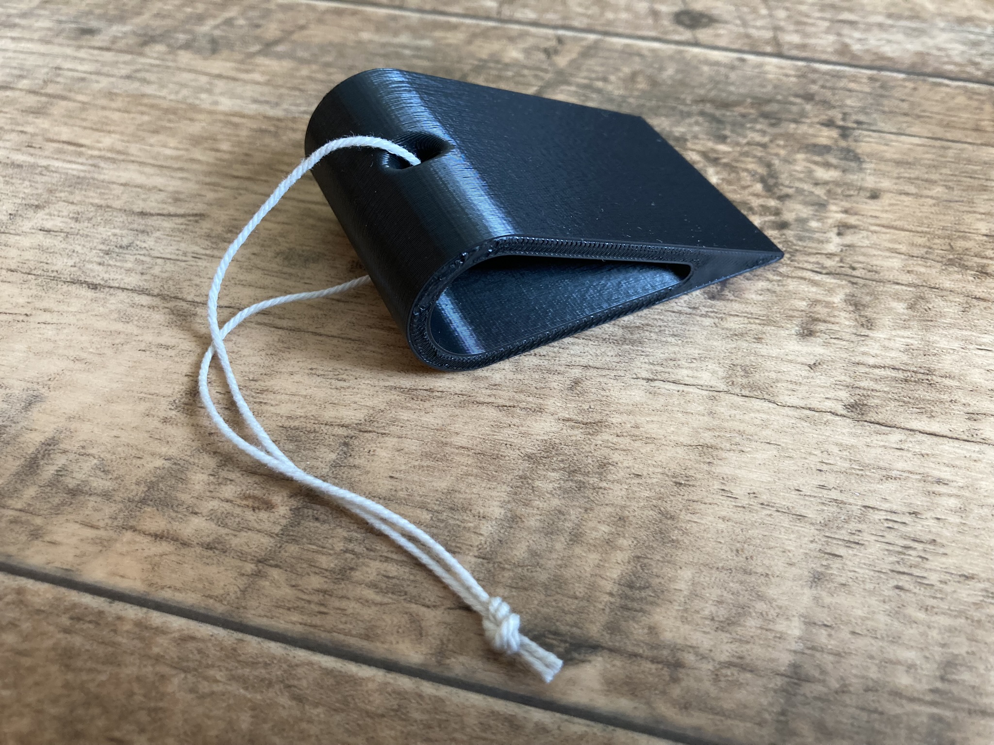 Door stopper (with hool for string)