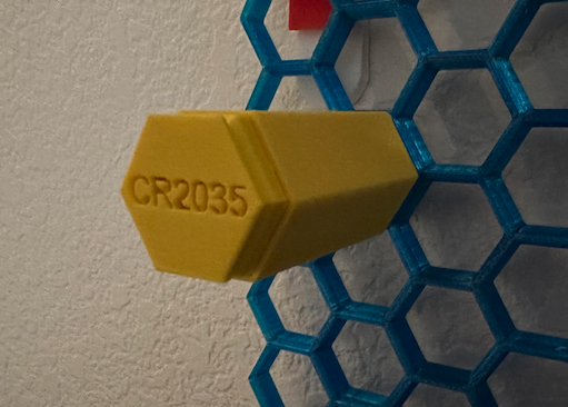 Lithium coin cell CR2032, CR2035 storage - Honeycomb Wall  with Battery Type Labels
