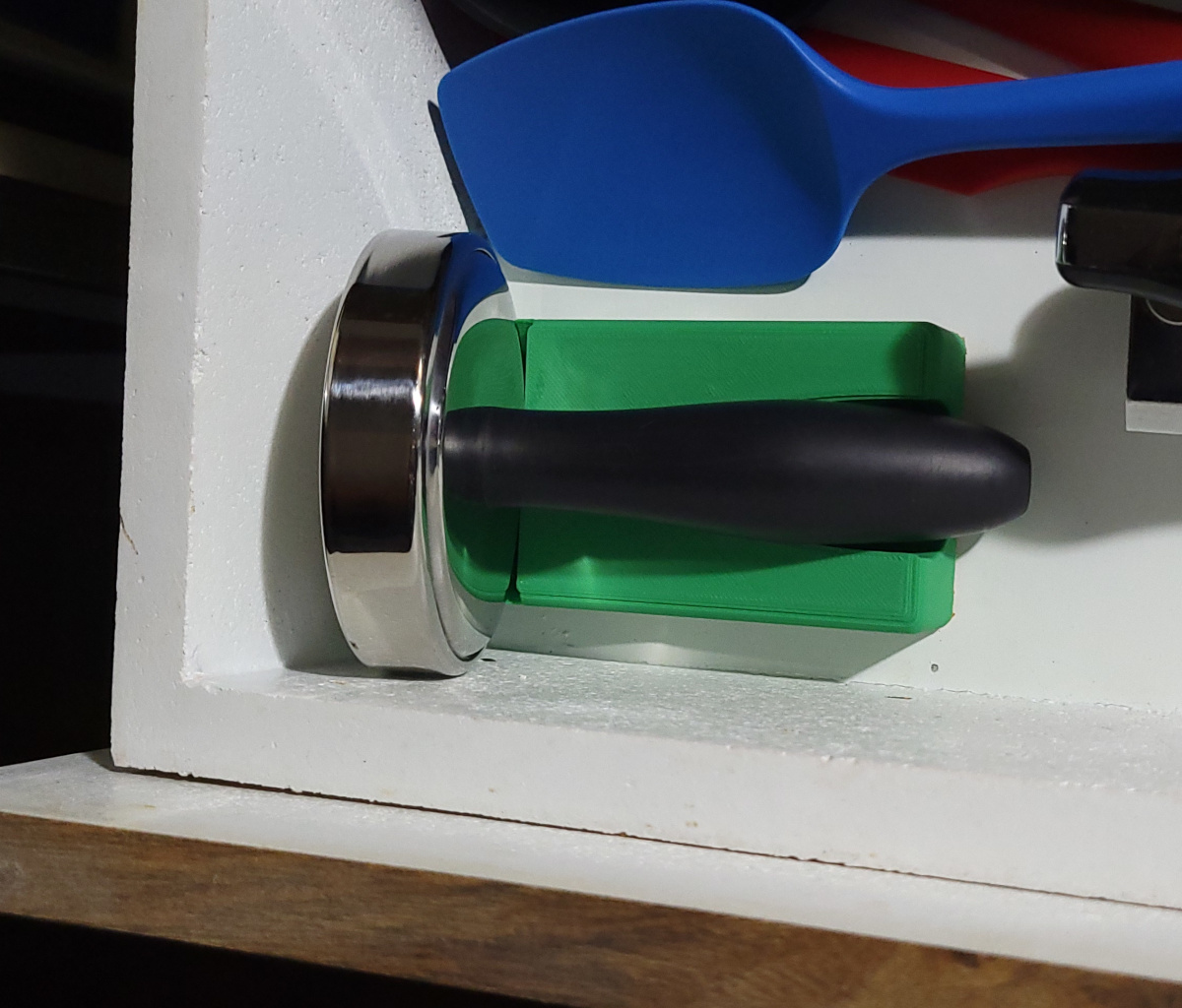 Holder for kitchen meat pounder