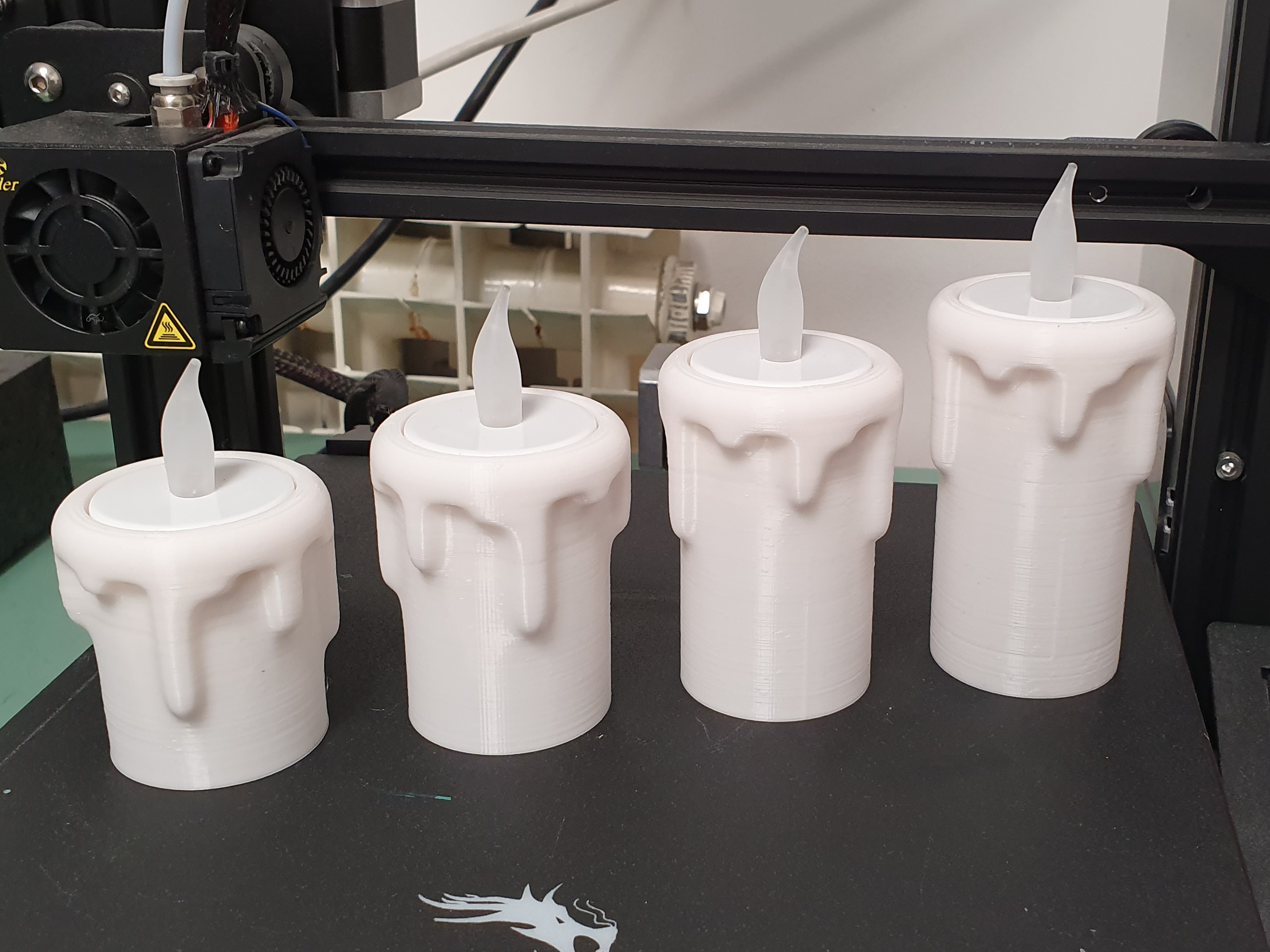 Melting candle tea light holder