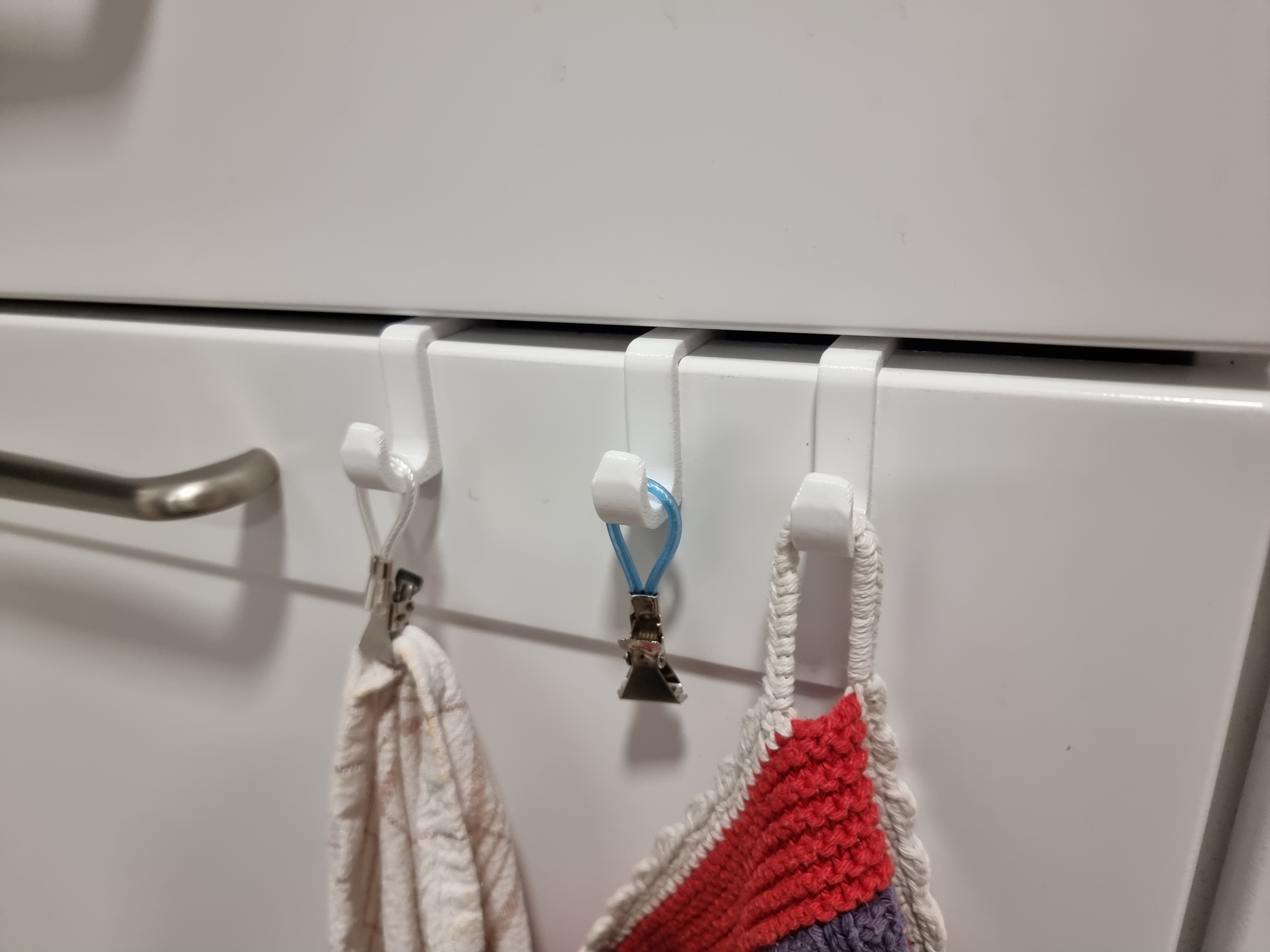 Kitchen towel hanger