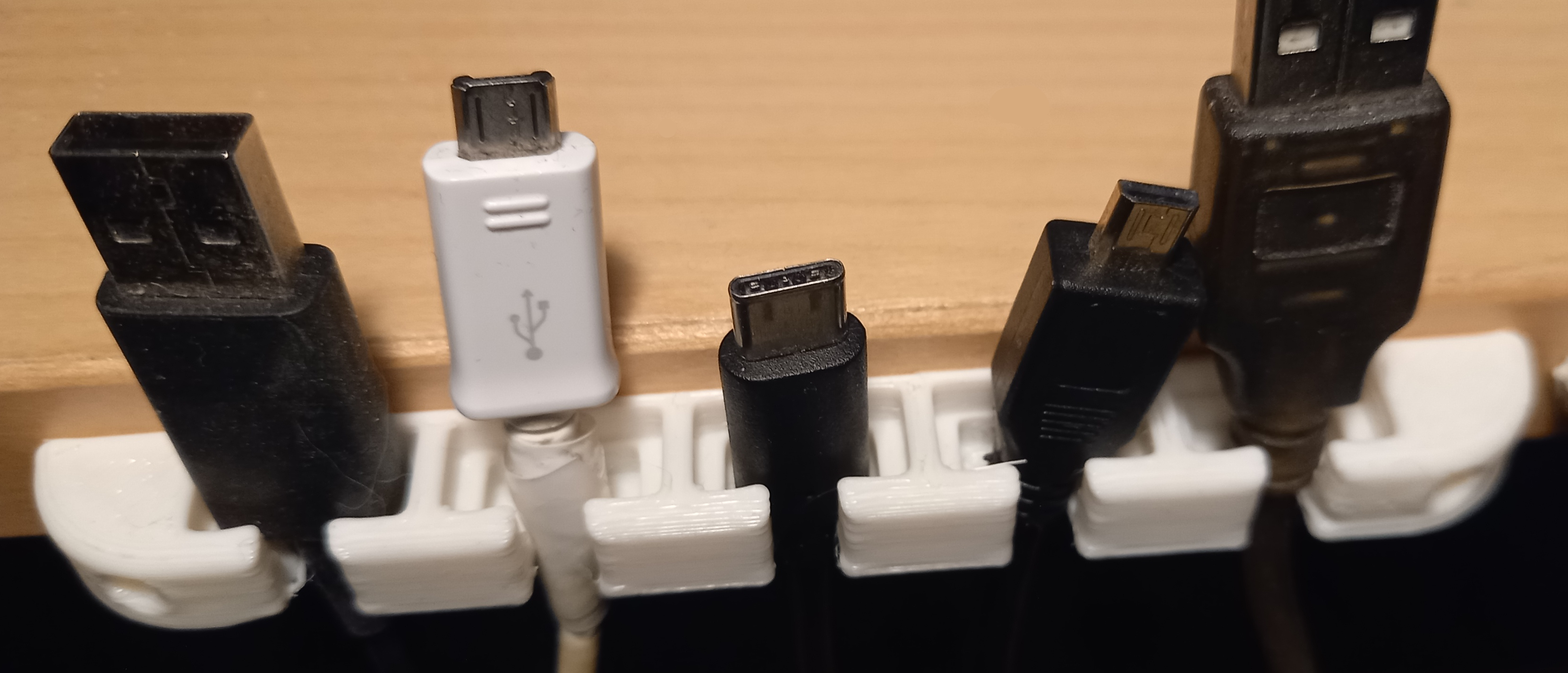 USB / Charging cable hanger