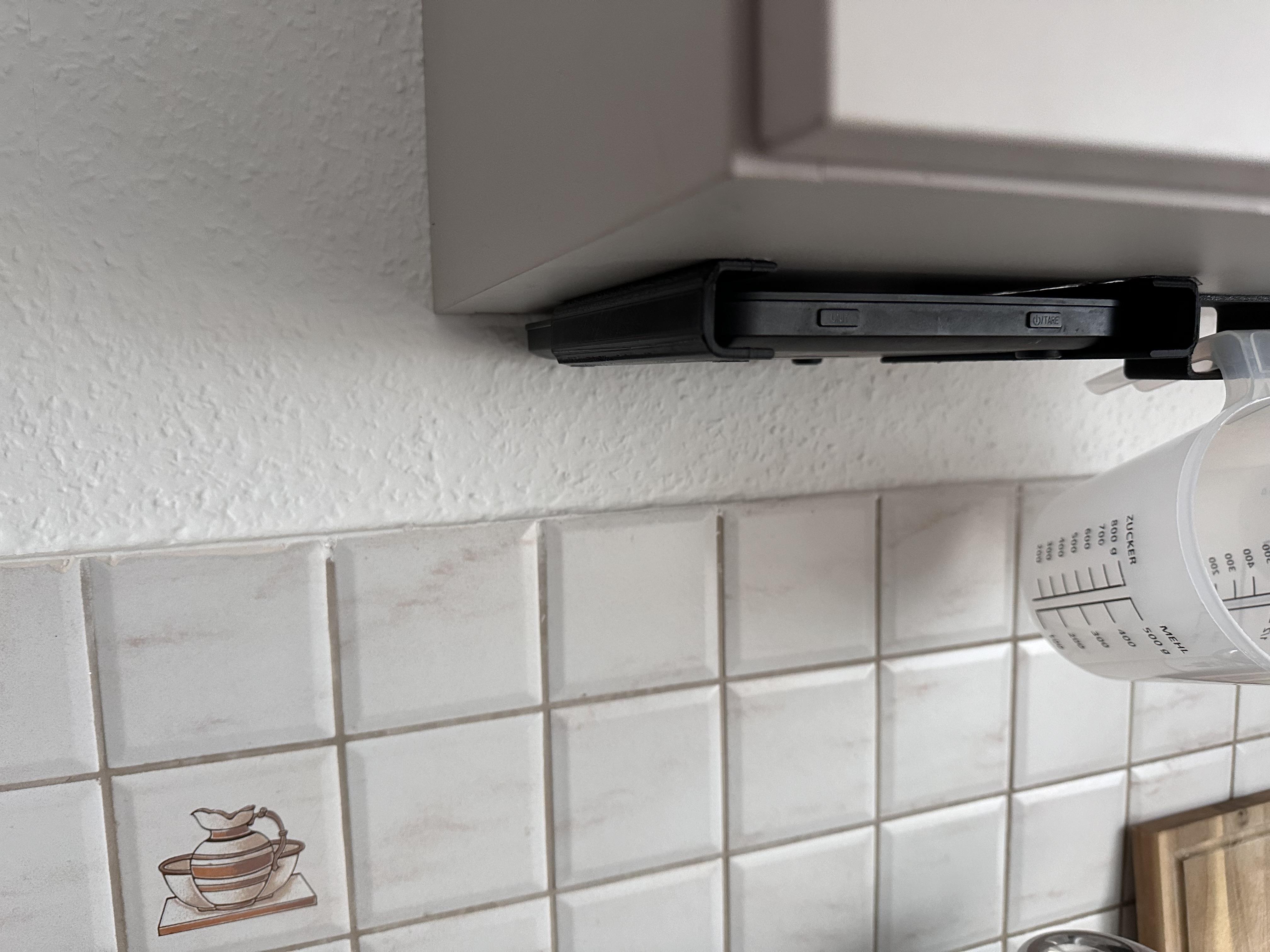 Holder for kitchen scales