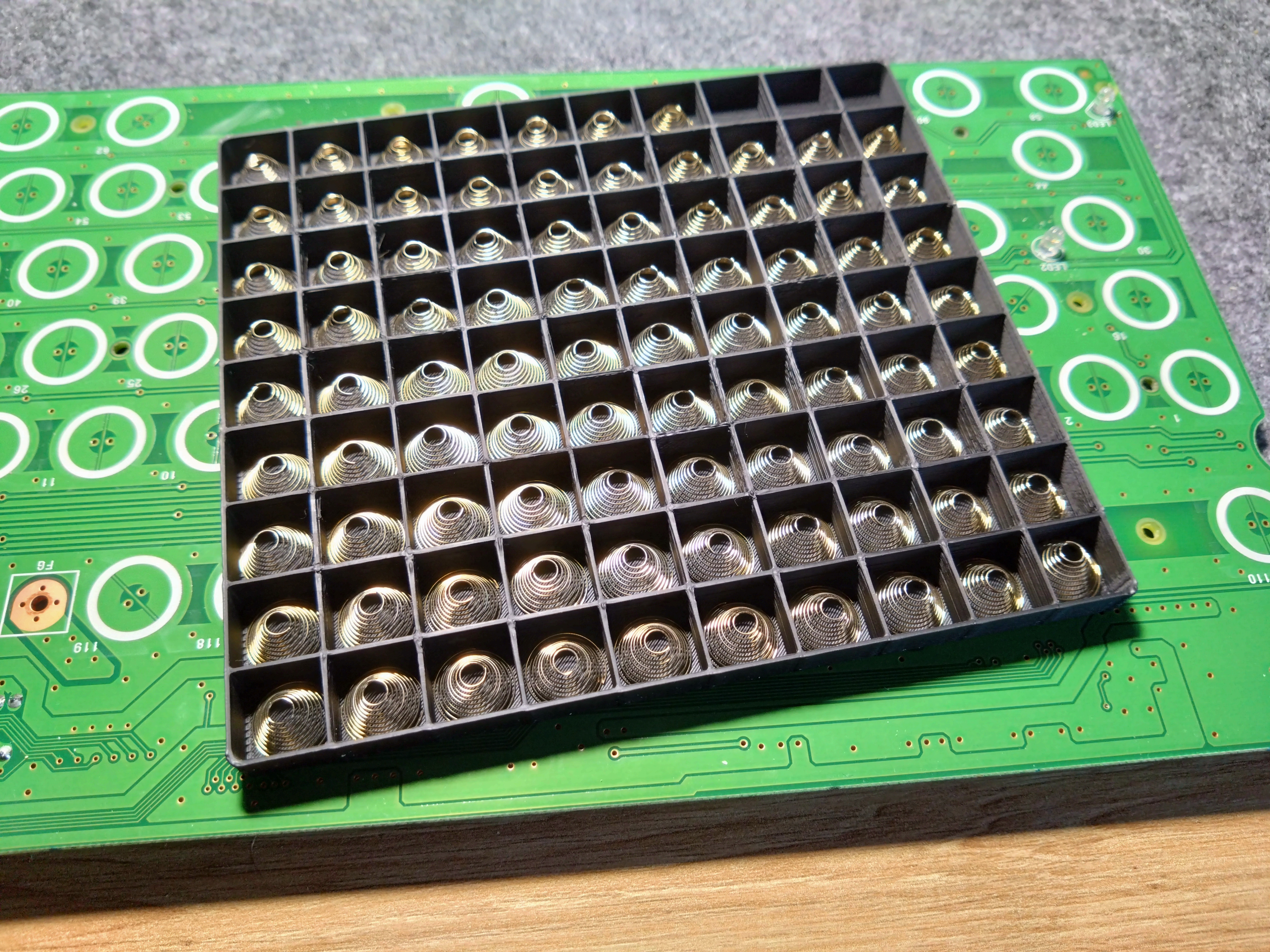 Topre switch spring tray