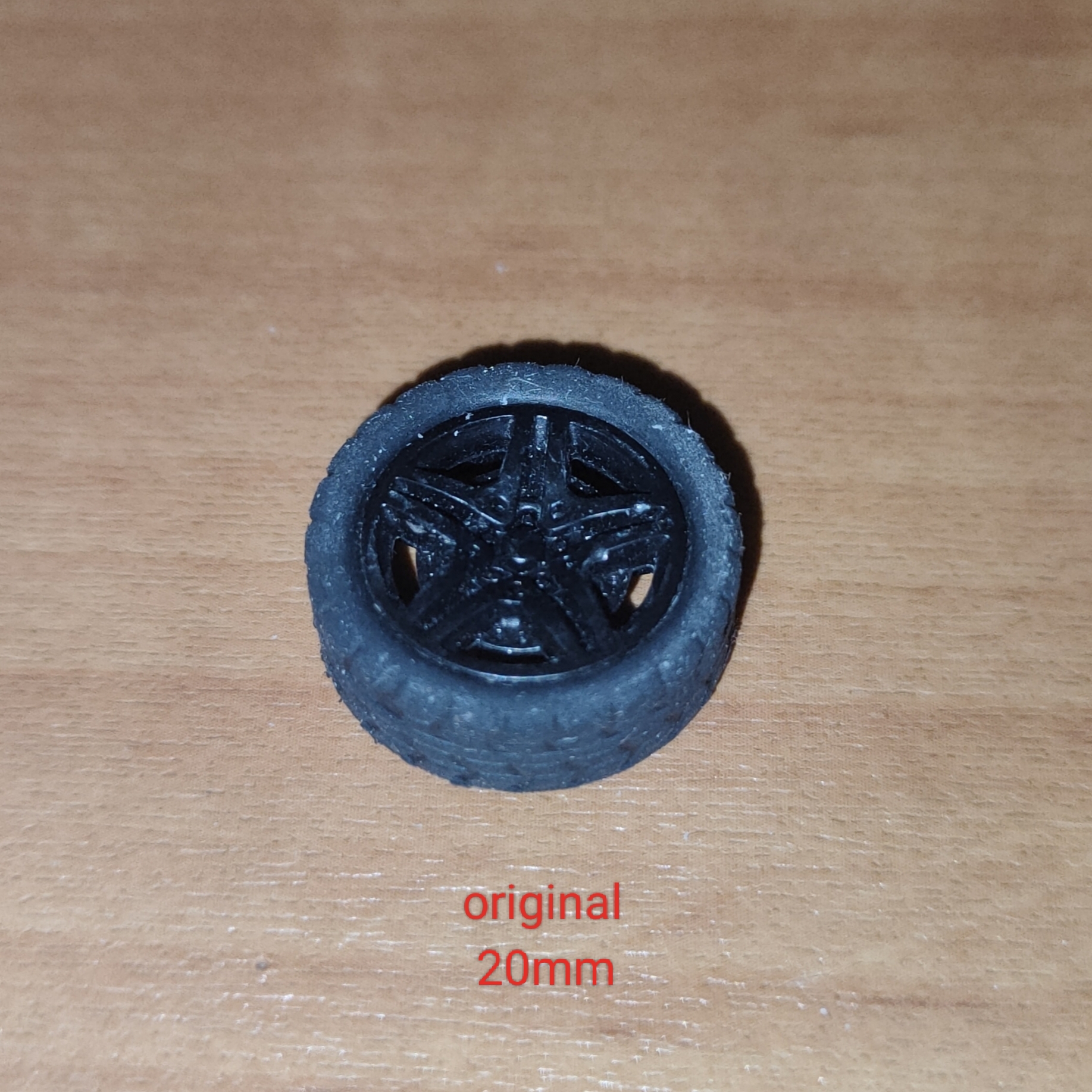 A wheel from a toy car - photo 4