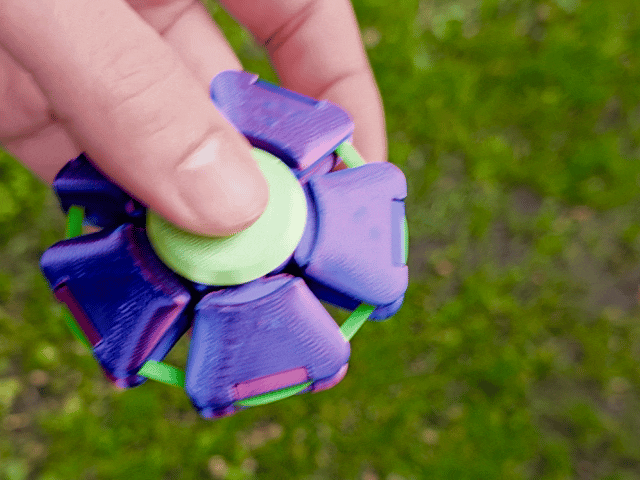Spin'n'Squeeze Fidget Toy - photo 2