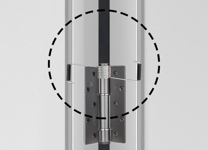 Protective Backing for Door Hinge Spring
