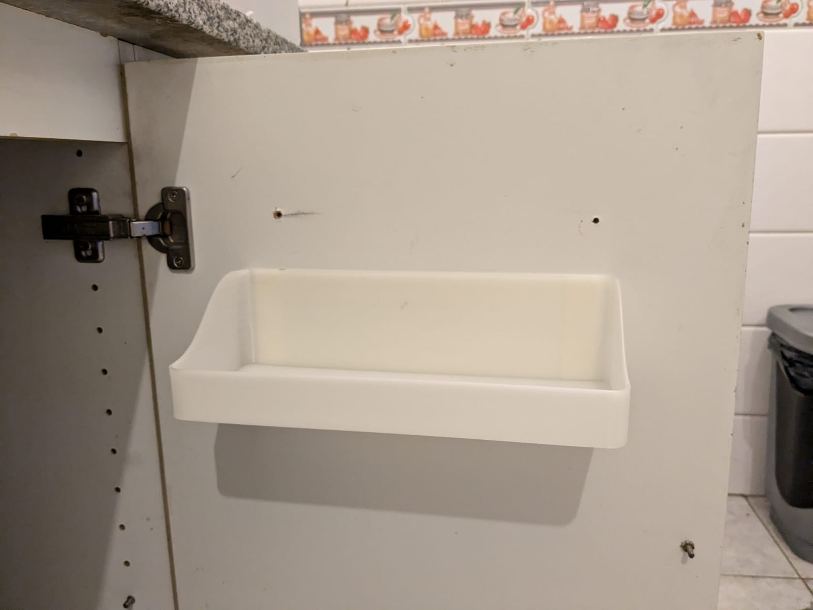 Cabinet door shelf