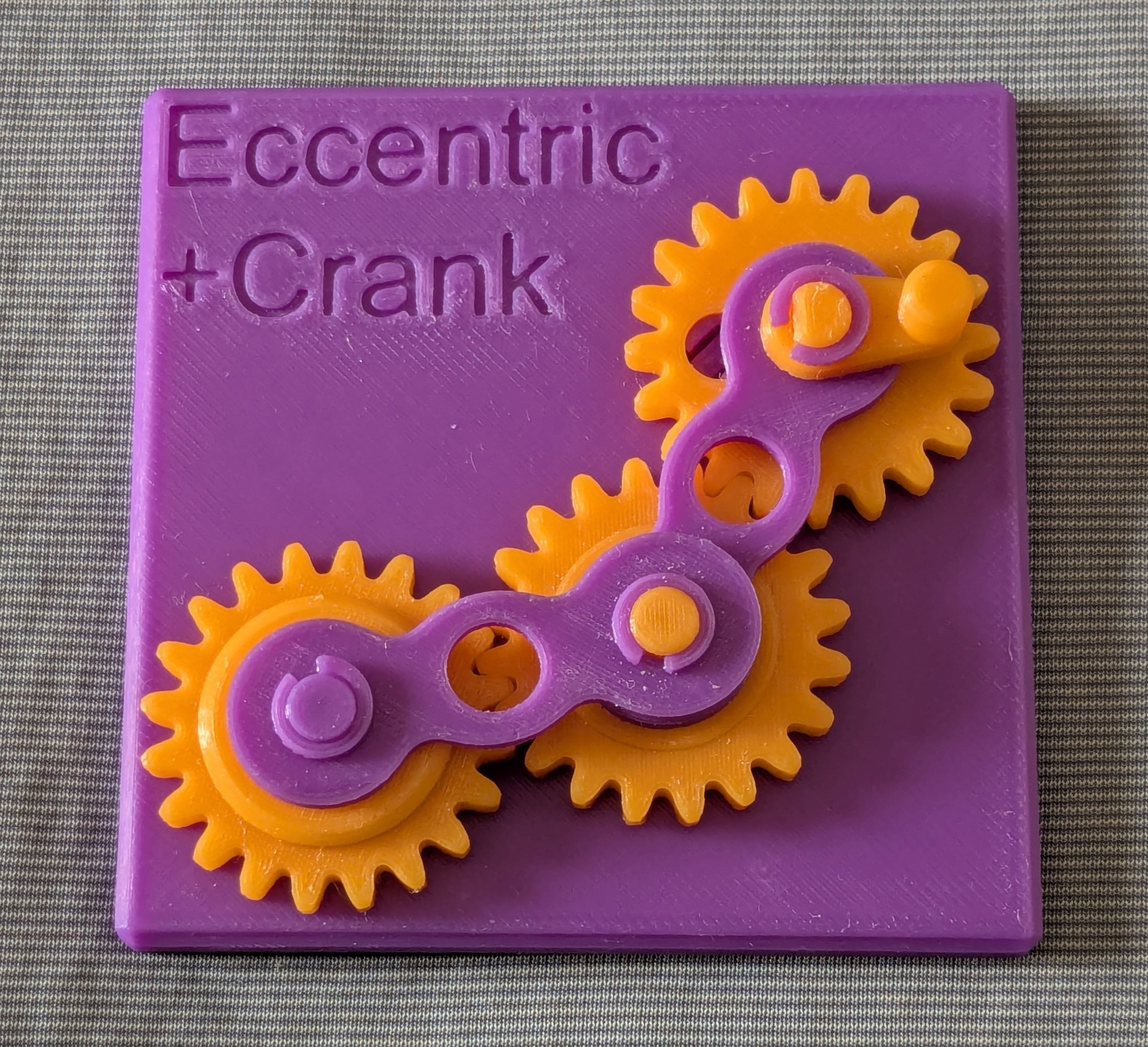 Educational Model of Eccentric Gear with Crank-Rocker Mechanism