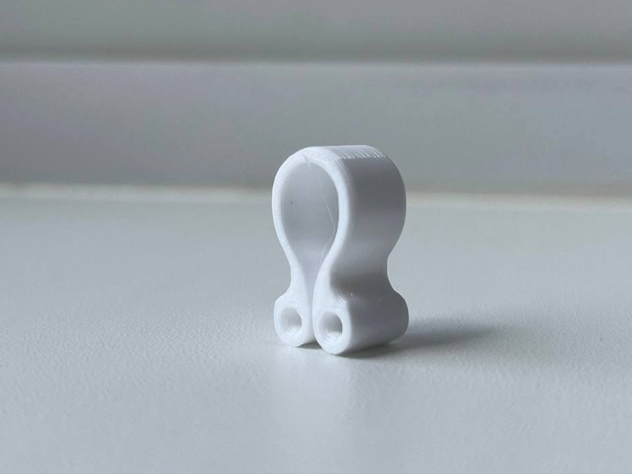 Two-side universal filament clip